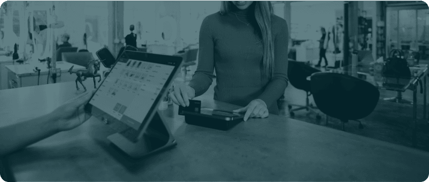 Customer completing a retail purchase at a connected point of sale
